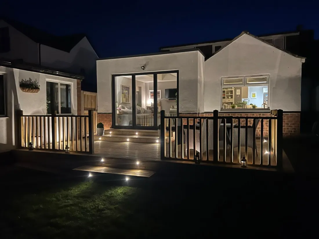 Garden decking with built-in lighting at dusk