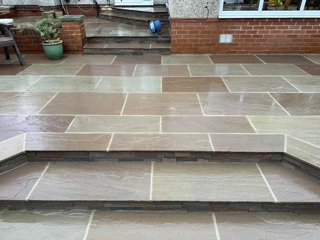 Natural stone patio with steps, newly laid